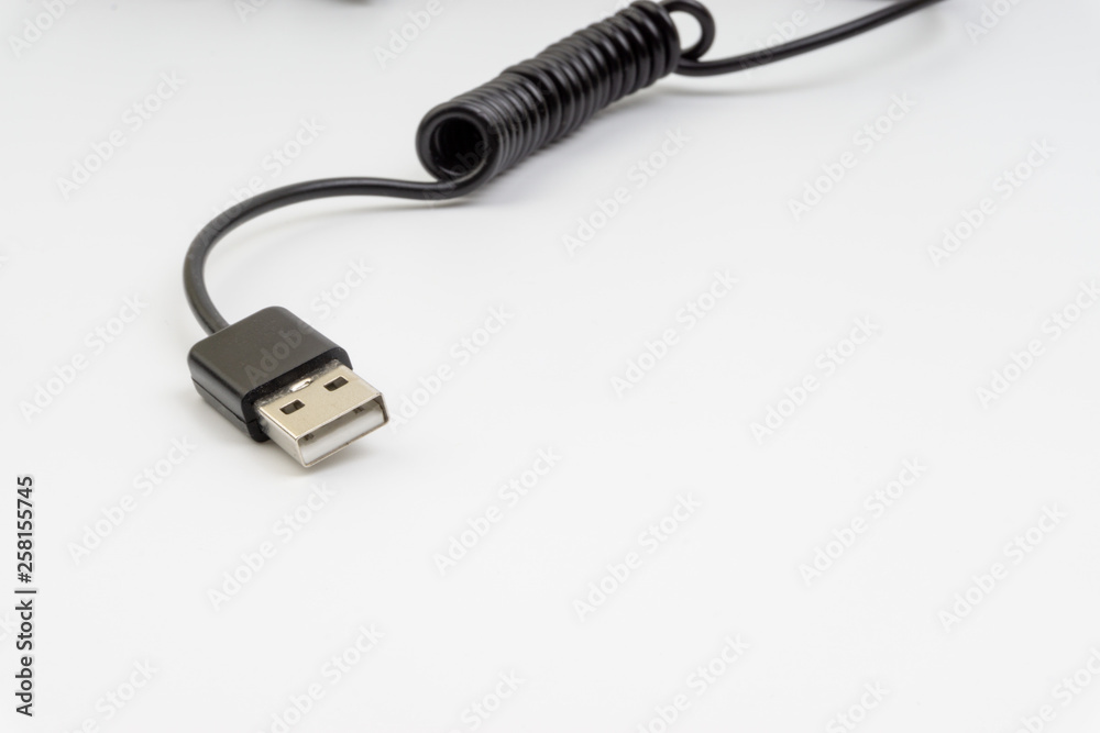 Universal recharger head isolated on white background. Selective focus and crop fragment Universal recharger head isolated on white background. Selective focus and crop fragment