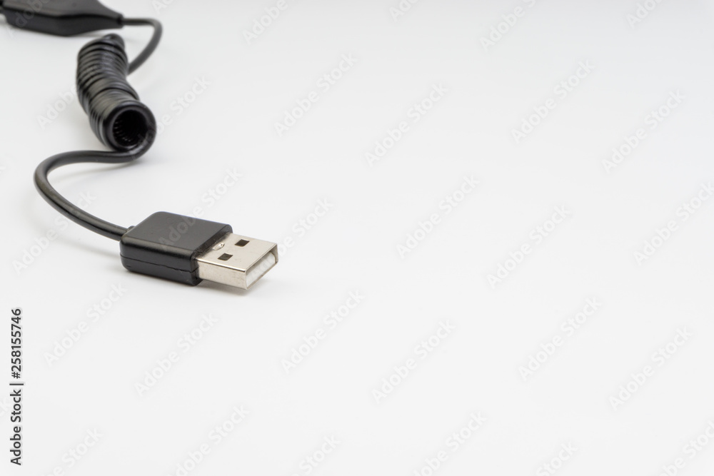 Universal recharger head isolated on white background. Selective focus and crop fragment Universal recharger head isolated on white background. Selective focus and crop fragment