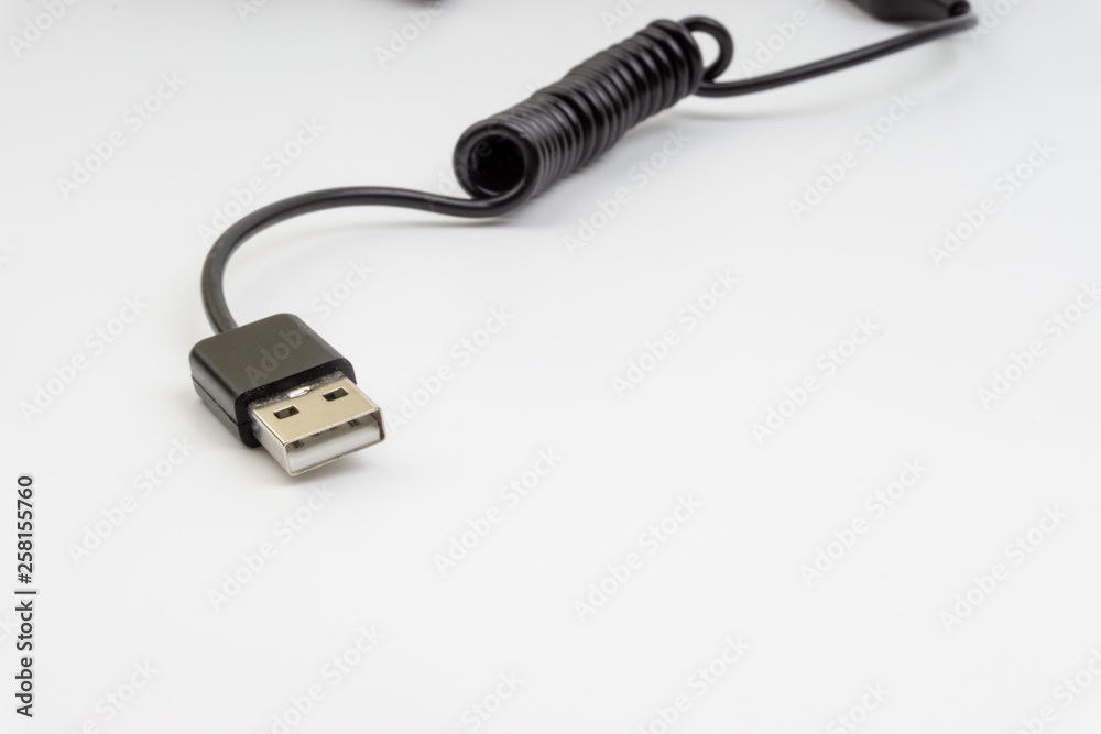 Universal recharger head isolated on white background. Selective focus and crop fragment Universal recharger head isolated on white background. Selective focus and crop fragment