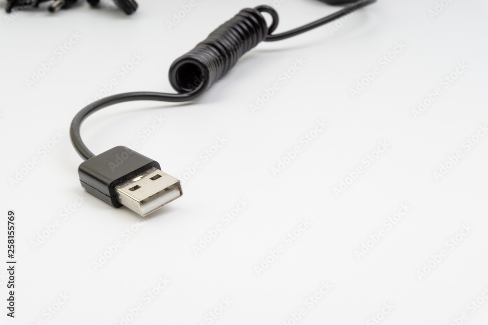 Universal recharger head isolated on white background. Selective focus and crop fragment Universal recharger head isolated on white background. Selective focus and crop fragment