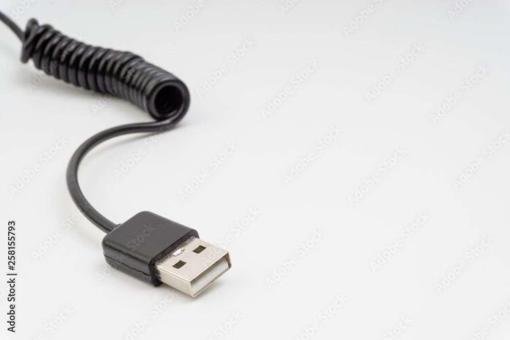 Universal recharger head isolated on white background. Selective focus and crop fragment Universal recharger head isolated on white background. Selective focus and crop fragment