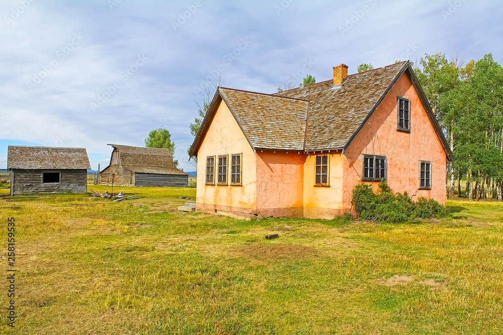 Less frequently photographed view of Moulton Barn with Pink Stucco House in foreground Less frequently photographed view of Moulton Barn with Pink Stucco House in foreground