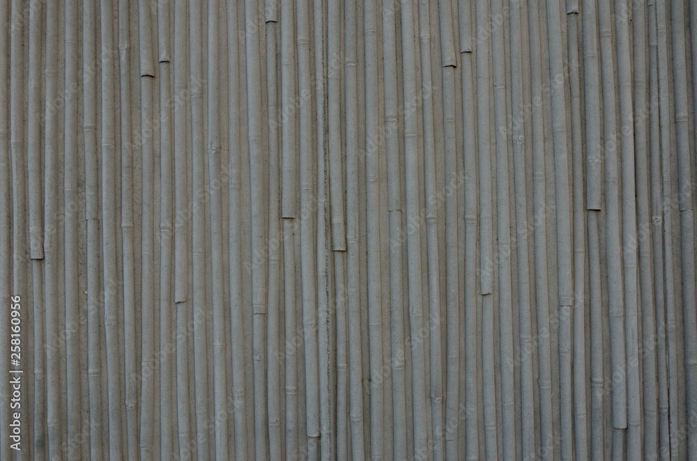 Bamboo structure background on concrete wall Bamboo structure background on concrete wall