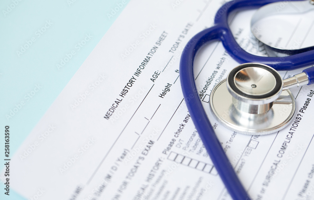 Stethoscope and patient medical history form. Health check diagnostics concept. Stethoscope and patient medical history form. Health check diagnostics concept.