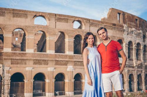 Happy couple in Rome over Coliseum background. Italian european vacation © travnikovstudio