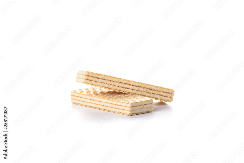 Multi-layered waffles with white creamy filling isolated on white background. Multi-layered waffles with white creamy filling isolated on white background.