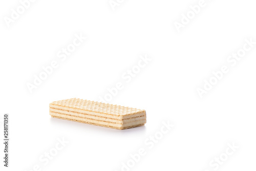 Multi-layered waffles with white creamy filling isolated on white background.