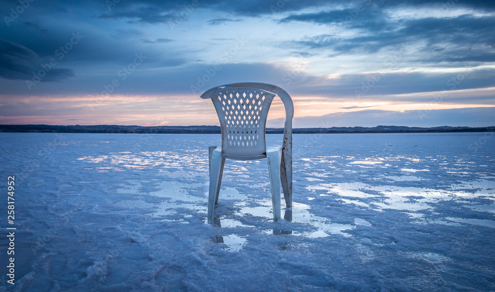 view of the salt mines with an old plastic chair sunning