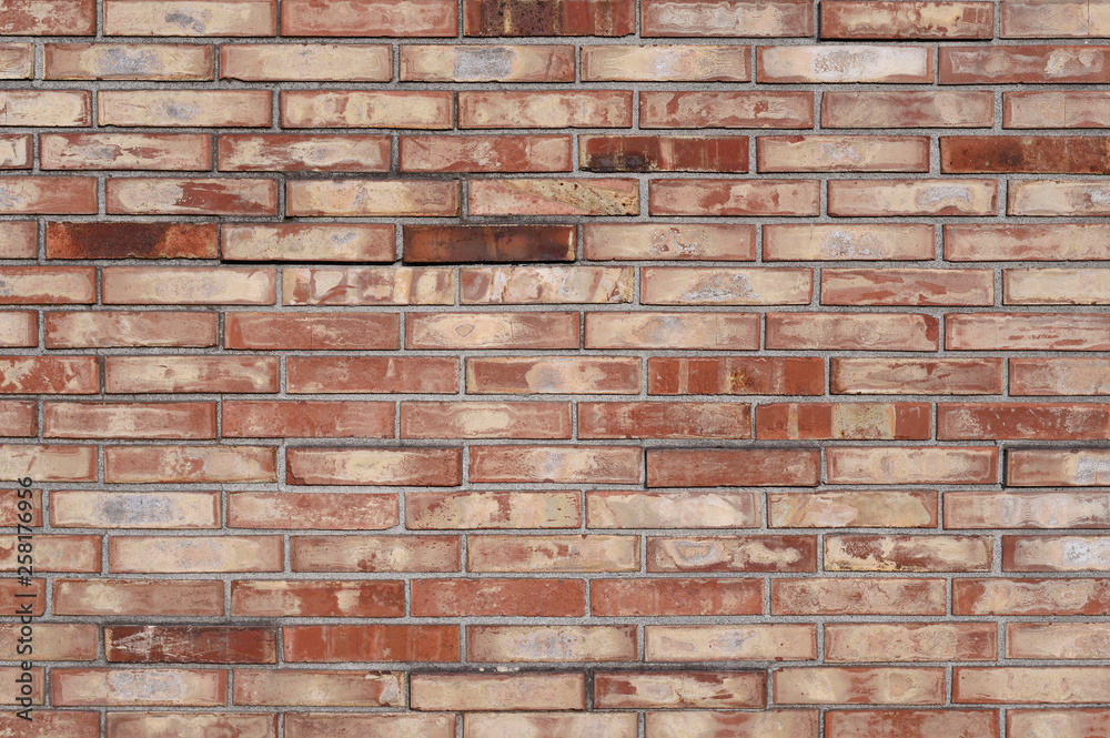 Fototapeta premium Old red brick wall background texture close up