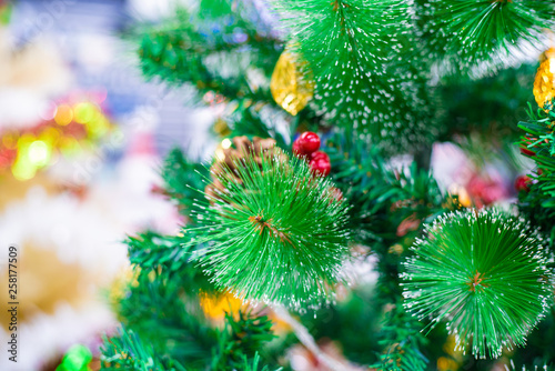 Beautiful decorated object on christmas tree with blurred bokeh light © themorningglory