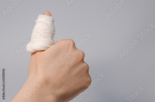 a finger in bloody bandage