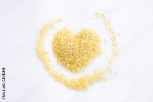 rice lies on a white background many heart