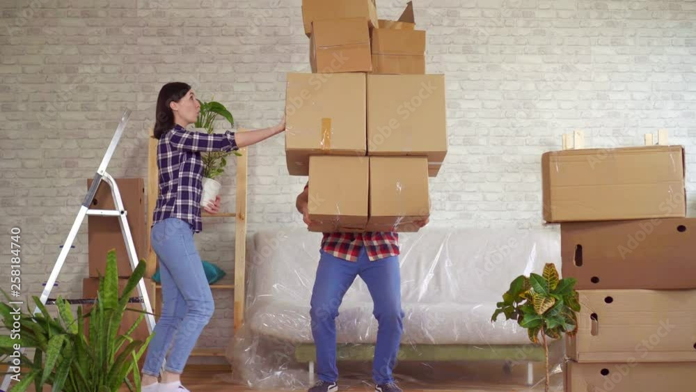 Fale man falls with boxes, problems when moving to a new apartment