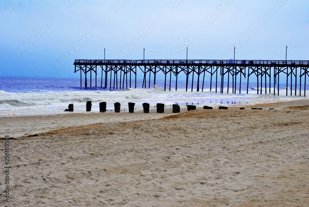Pier on a Beach with Breaking Waves 