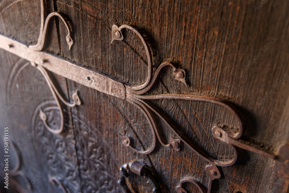 Detail of Norwegian metal work on the antique door Detail of Norwegian metal work on the antique door