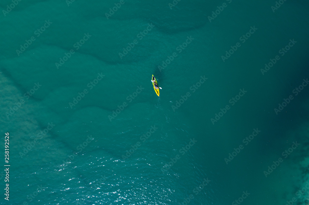 Kayak view from the sky in the middle of the ocean.