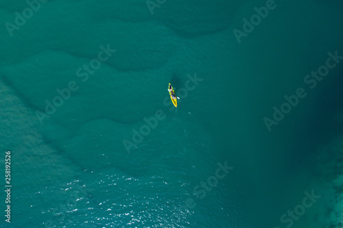 Kayak view from the sky in the middle of the ocean.