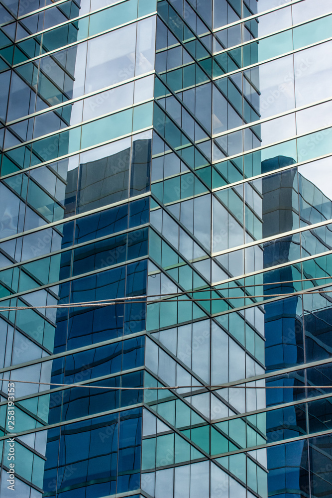 Obraz premium Geometrical Patterns in Office Building Windows