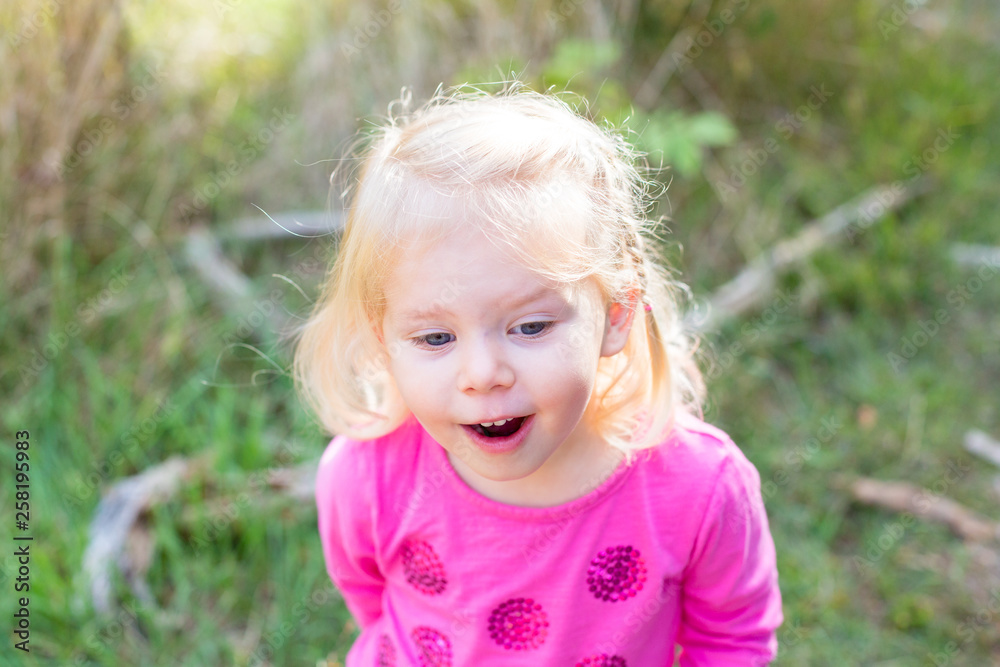 Girl smiling outdoors Girl smiling outdoors