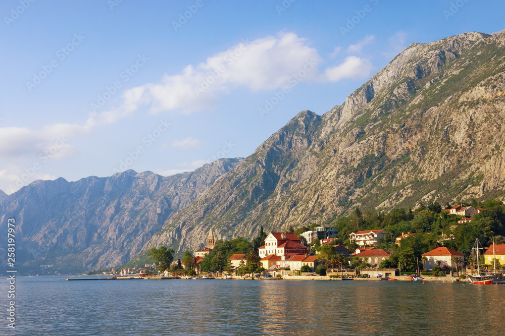Beautiful Mediterranean landscape. Montenegro, Adriatic Sea. View of Bay of Kotor and  seaside Dobrota town on sunny summer day