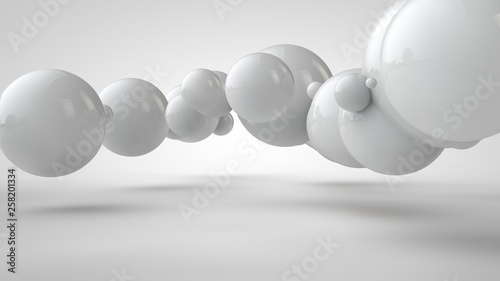 3D illustration of balls of different sizes hanging in space. The idea of order, chaos and harmony. Abstraction. Comparative image of the geometry of space. 3D rendering isolated on white background. © Станислав Чуб