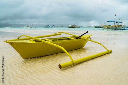 Colorful traveling boat in the sea with clouds and blue sky at Boracay Island, Philippines. For nature background.