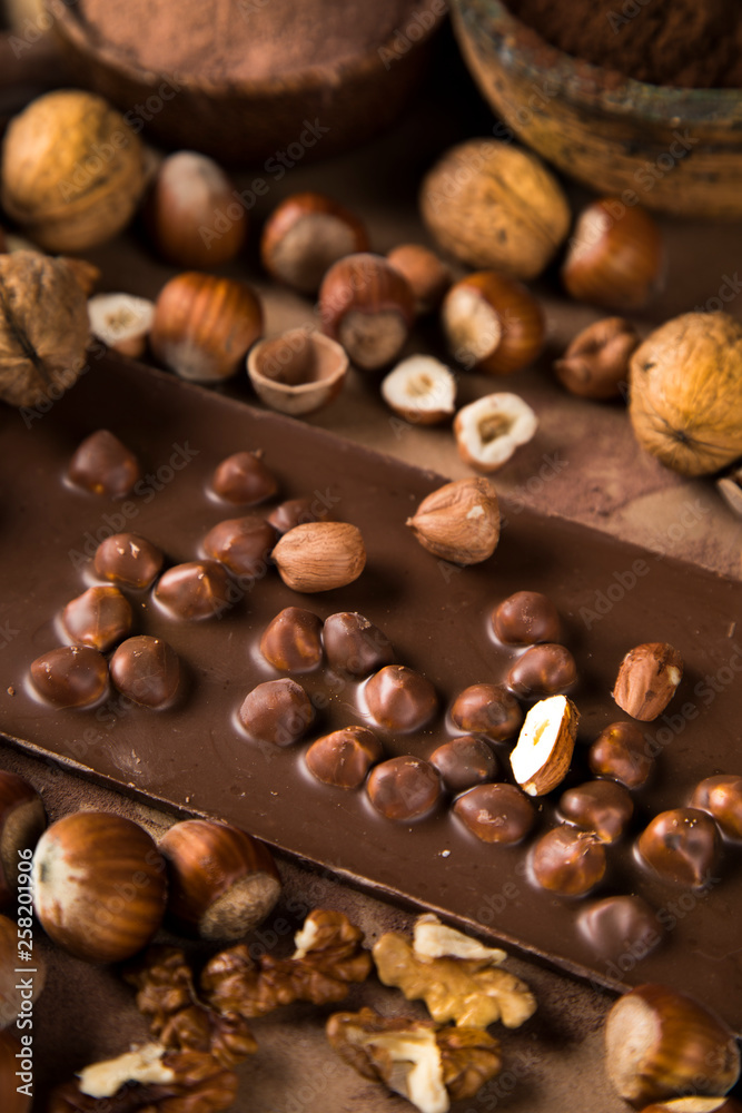 Chocolate bar, candy sweet, cacao beans and powder Chocolate bar, candy sweet, cacao beans and powder