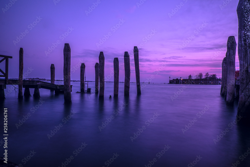 Violet sunset on water reflection in venice laguna Violet sunset on water reflection in venice laguna