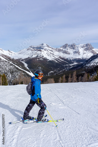 Young Skier on top of  Mountain at Lake Louise in the Canadian Rockies