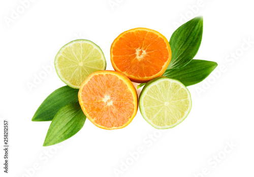 Fototapeta Naklejka Na Ścianę i Meble -  Fruit assortment of tangerine and lime with leaves isolated on white background