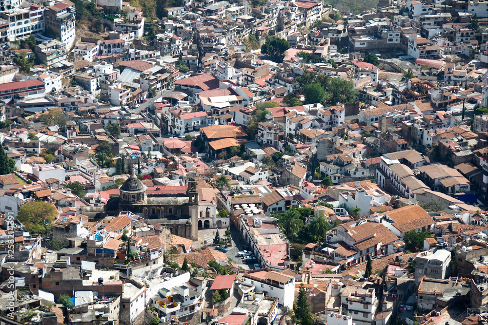 Panoramic view of the historic center, showing the traditional white houses with red tile roofs, Taxco, Guerrero, Mexico.