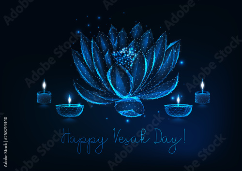 Happy Vesak day greeting card with lotus flower, diya oil lamps and candles on dark blue background.