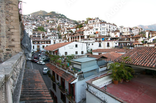 Panoramic view of the historic center, showing the traditional white houses with red tile roofs, Taxco, Guerrero, Mexico.