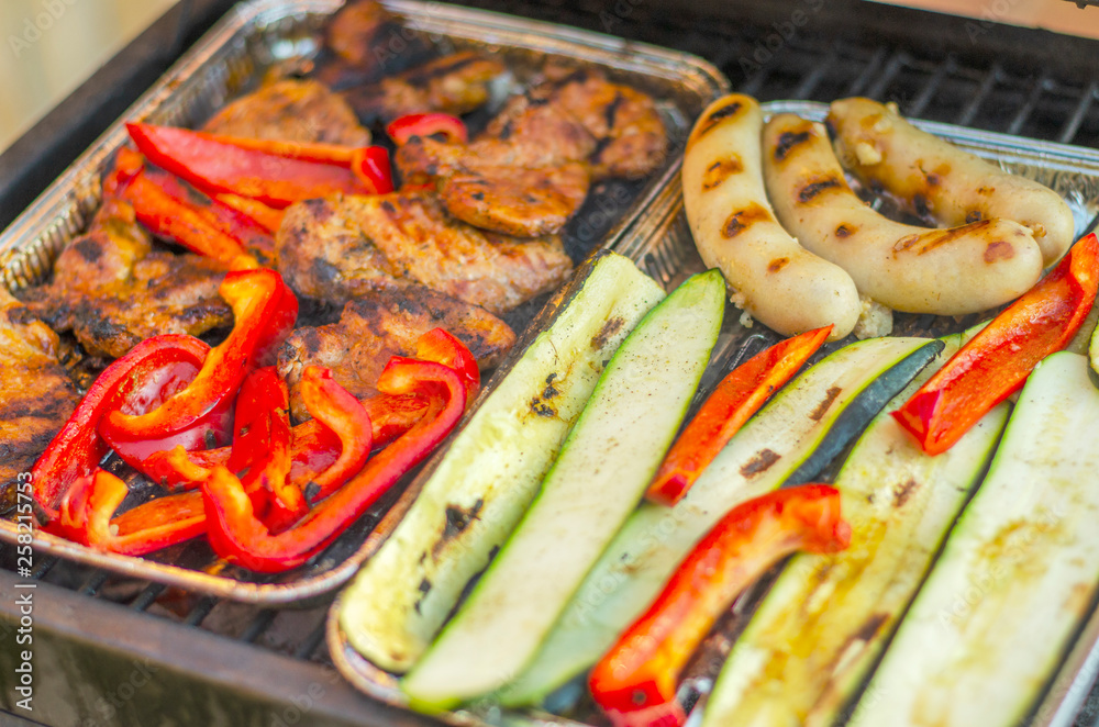 Meat and vegetables on the grill Meat and vegetables on the grill