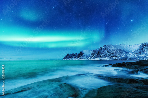 Natural phenomenon - aurora borealis on Lofoten islands in Norway, Scandinavia - the UNESCO world heritage spot, location - Senja island, Tromso on March. © Feel good studio