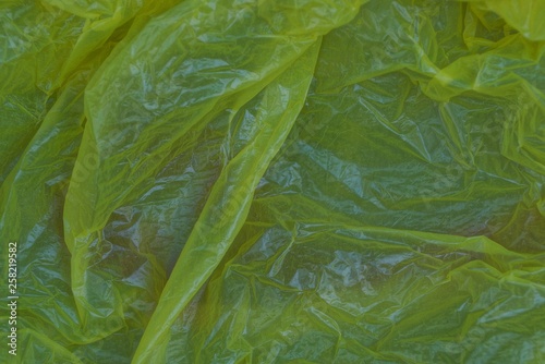 plastic yellow texture from a piece of crumpled cellophane