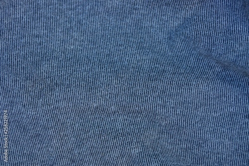 dark gray fabric texture from a piece of fabric on clothes