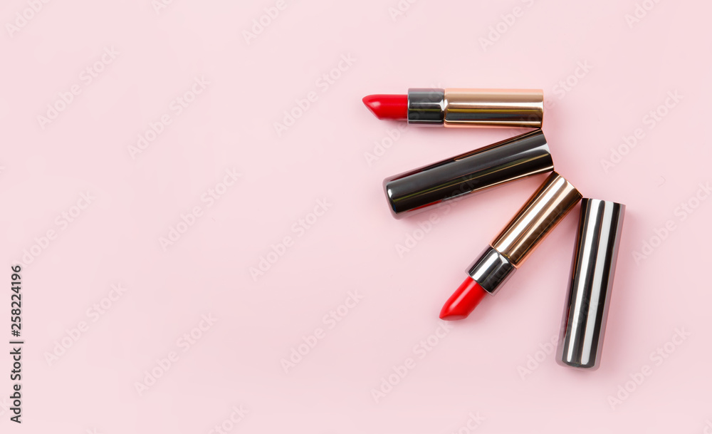 set of lipstick, lip gloss on pink background. Woman's cosmetics. Women's morning secrets. Cosmetics, lipstick. Make up collection set of lipstick, lip gloss on pink background. Woman's cosmetics. Women's morning secrets. Cosmetics, lipstick. Make up collection