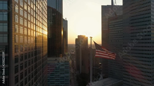 4K American Flag Waving Slow Motion Dallas Texas Skyline Drone Aerial Sunset