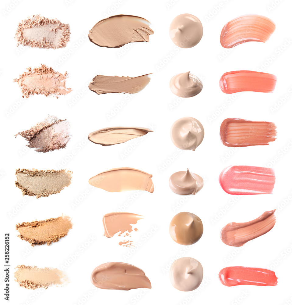 Set with swatches of lipsticks, eye shadows and skin foundations on white background, top view Set with swatches of lipsticks, eye shadows and skin foundations on white background, top view