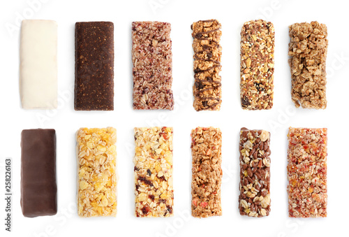 Cuadro en lienzo Set of different sweet protein bars on white background, top view