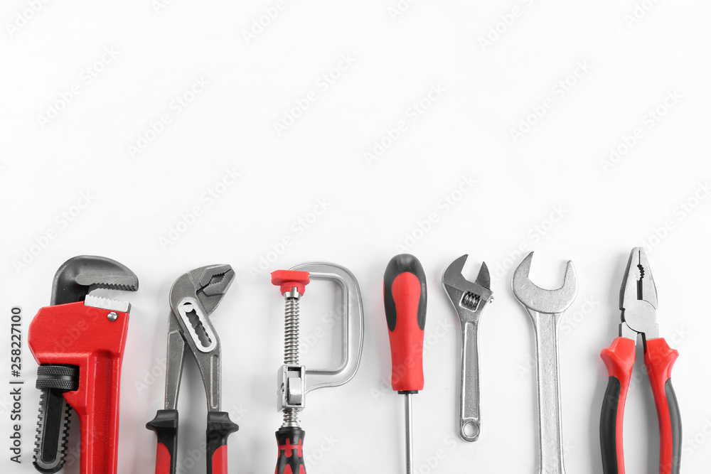Flat lay composition with construction tools on white background. Space for text Flat lay composition with construction tools on white background. Space for text