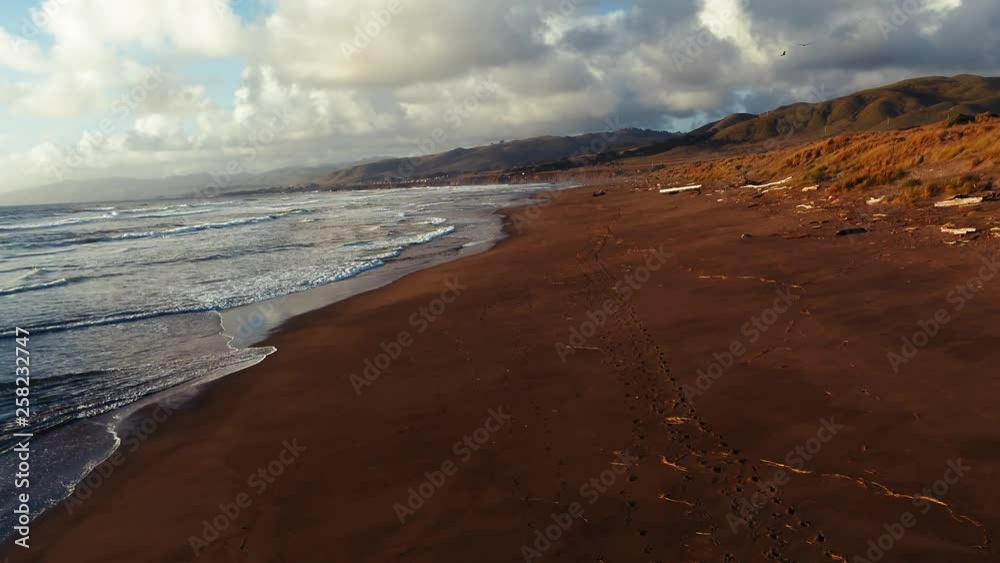 Waves Splashing against a Secluded Beach Shore Waves Splashing against a Secluded Beach Shore
