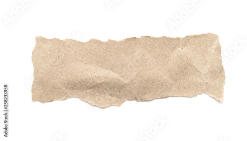 Recycled paper craft stick on a white background. Brown paper torn or ripped pieces of paper isolated on white.