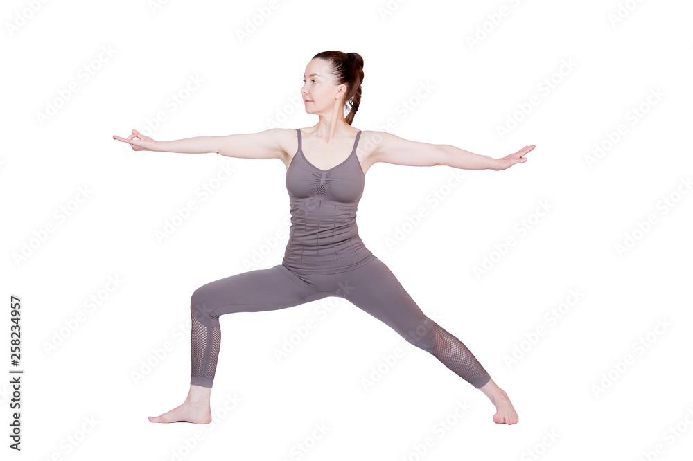 young girl performs different poses of yoga, flexible beautiful model on a white background. meditation and asanas.