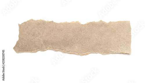 Recycled paper craft stick on a white background. Brown paper torn or ripped pieces of paper isolated on white.