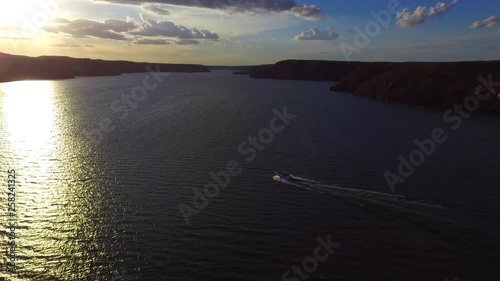 Sunset on river filmed by drone - Boat Sailing - Piranhas, Brazil