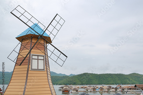 Old style decoration windmill in nature park  Thailand.