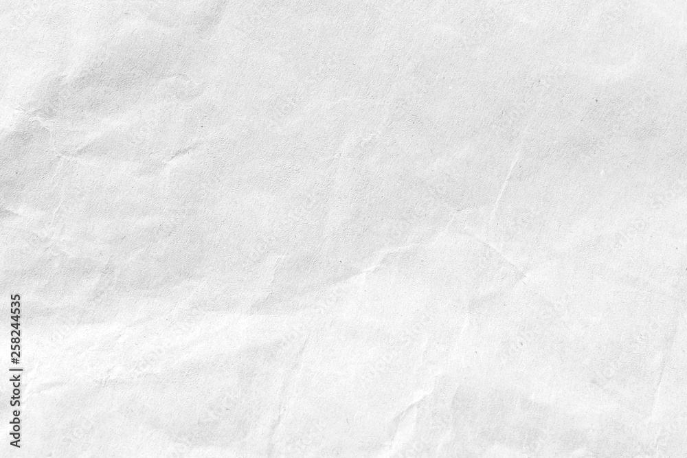 White crumpled paper texture background. Close-up. White crumpled paper texture background. Close-up.