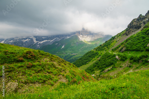 Alpine peaks landskape background. Jungfrau, Bernese highland. Alps, tourism, journey, hiking concept.